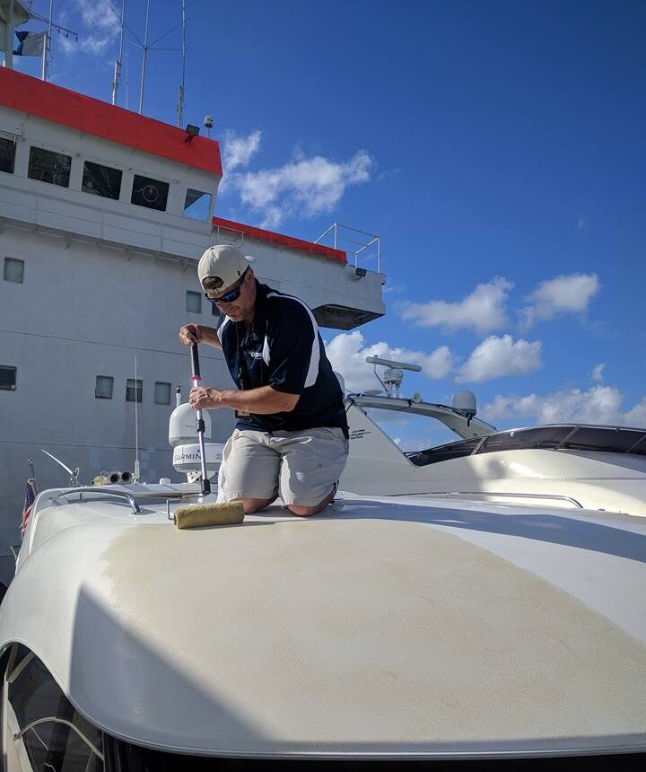 Man applying Liquid Shield Wrap